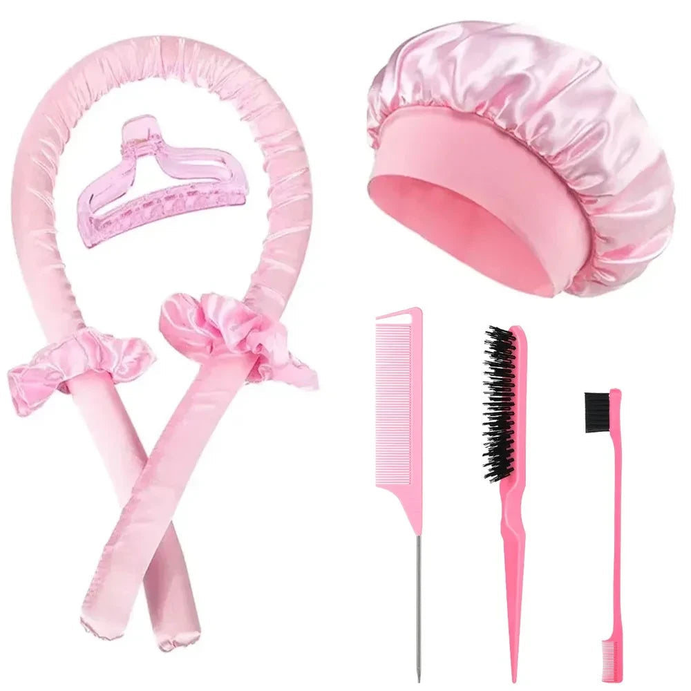 Seraphic heatless hair curling set in soft pink satin, including a curling rod, bonnet, clips, and styling brushes.